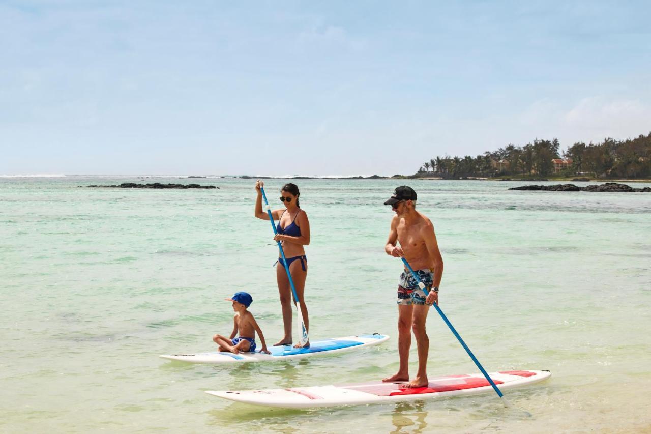 C Mauritius (Adults Only) Hotel Belle Mare Exterior foto Stand up paddle boarders in Mauritius