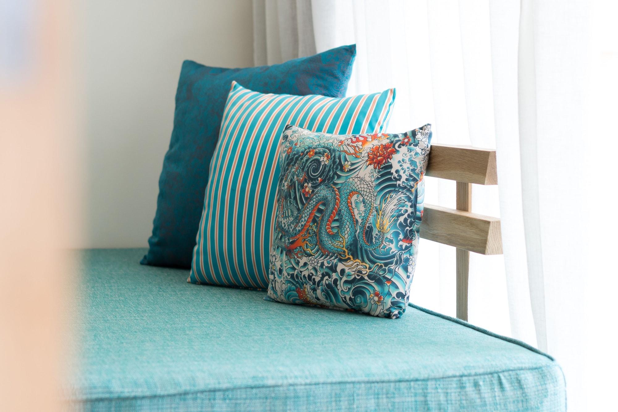 C Mauritius (Adults Only) Hotel Belle Mare Exterior foto Cushions on a sofa